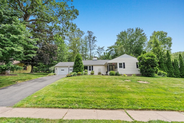 1981 Asylum Ave, West Hartford, CT 06117 - ranch-style home featuring driveway, an attached garage, a front lawn, and a chimney