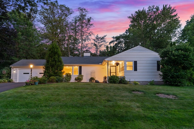 1981 Asylum Ave, West Hartford, CT 06117 - ranch-style home featuring asphalt driveway, a chimney, a front yard, and a garage