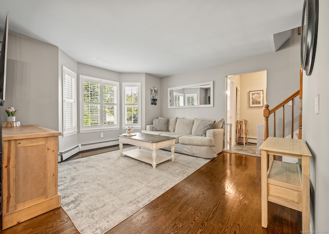 22 Quail Run, Bloomfield, CT 06002 - living room with dark wood-style floors, stairs, a baseboard radiator, and baseboard heating