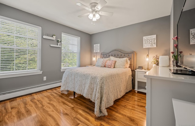 22 Quail Run, Bloomfield, CT 06002 - bedroom featuring light wood-style floors, multiple windows, and ceiling fan