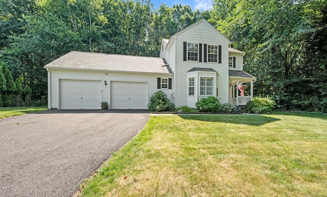 22 Quail Run, Bloomfield, CT 06002 - traditional-style home featuring driveway, an attached garage, a porch, a front yard, and a shingled roof