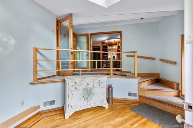 57 Notch Hill Rd, North Branford, CT 06471 - stairs featuring wood finished floors and baseboards