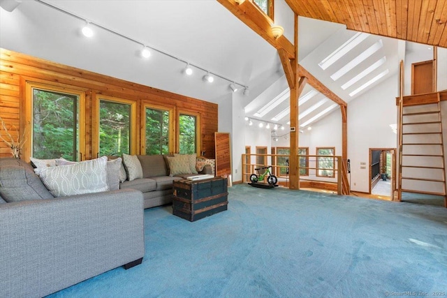 57 Notch Hill Rd, North Branford, CT 06471 - carpeted living area with french doors, high vaulted ceiling, track lighting, and stairway