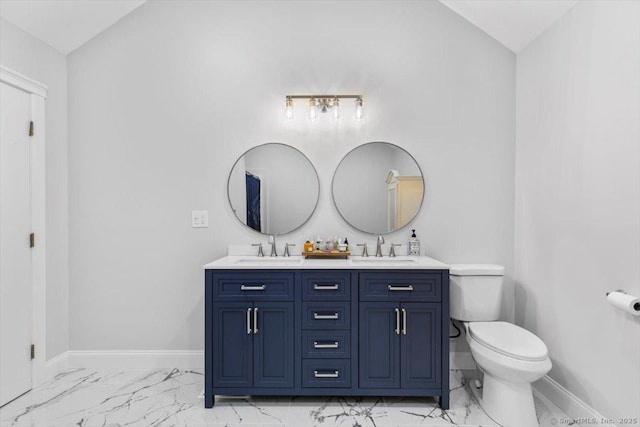 57 Notch Hill Rd, North Branford, CT 06471 - bathroom featuring marble look tiles, double vanity, and lofted ceiling