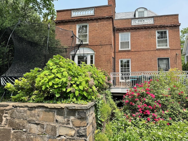 192 Bishop St, New Haven, CT 06511 - rear view of house with brick siding and mansard roof
