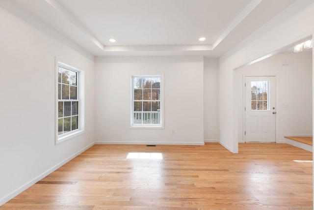 807 Pucker St, Coventry, CT 06238 - empty room with a tray ceiling, light wood finished floors, and recessed lighting