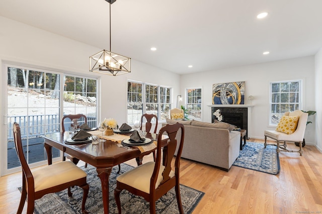 807 Pucker St, Coventry, CT 06238 - dining area with a chandelier, light wood-type flooring, plenty of natural light, and recessed lighting