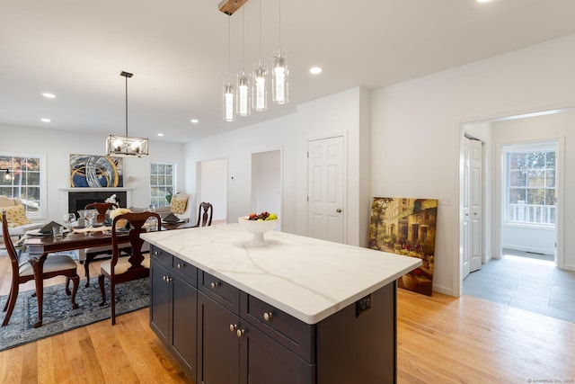 807 Pucker St, Coventry, CT 06238 - kitchen featuring healthy amount of natural light, light wood finished floors, a center island, and recessed lighting