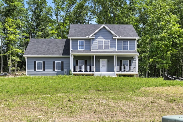 807 Pucker St, Coventry, CT 06238 - colonial-style house with covered porch, roof with shingles, and a front yard