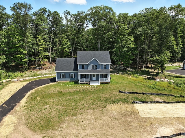 807 Pucker St, Coventry, CT 06238 - colonial house with a porch, a front lawn, and asphalt driveway