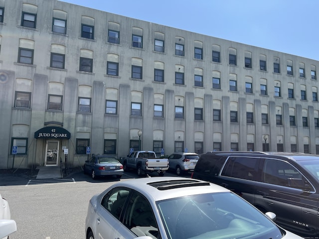 137 Judd Sq Unit 137, Wallingford, CT 06492 - view of building exterior with uncovered parking