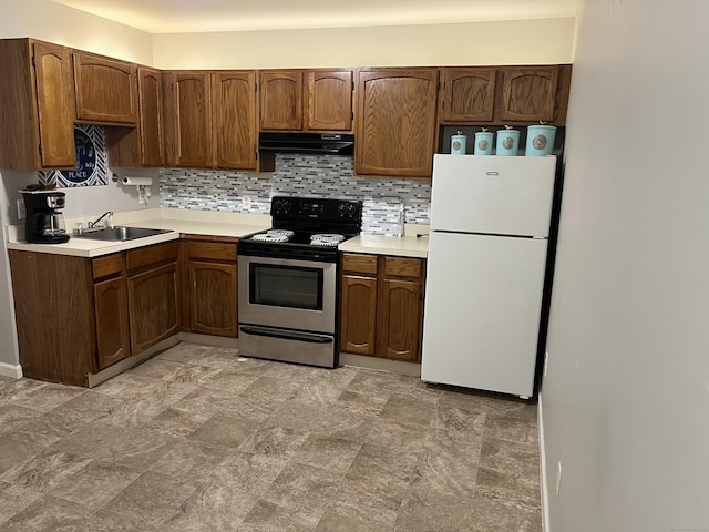 137 Judd Sq Unit 137, Wallingford, CT 06492 - kitchen featuring freestanding refrigerator, stainless steel range with electric cooktop, range hood, and light countertops