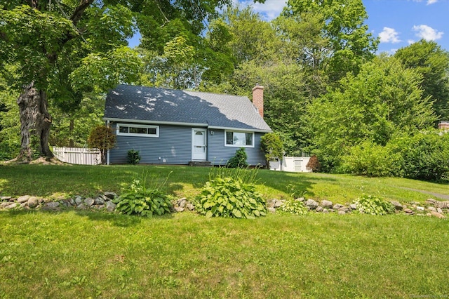 10 John Smith Dr, West Hartford, CT 06107 - view of front of property featuring a chimney and a shingled roof
