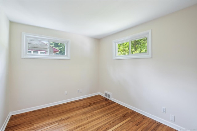 10 John Smith Dr, West Hartford, CT 06107 - empty room featuring baseboards and wood finished floors