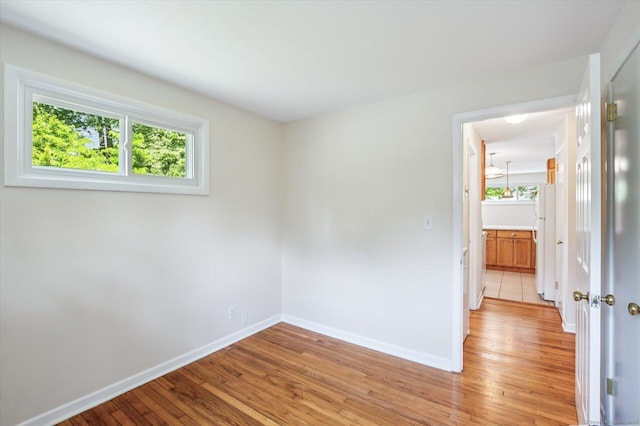 10 John Smith Dr, West Hartford, CT 06107 - empty room with light wood-style floors and baseboards