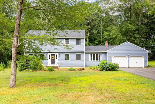 55 Charles Mary Dr, East Hampton, CT 06424 - colonial inspired home with a garage, a chimney, a front yard, asphalt driveway, and a shingled roof