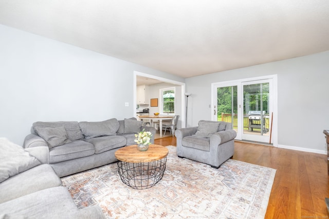 55 Charles Mary Dr, East Hampton, CT 06424 - living area with wood finished floors and baseboards