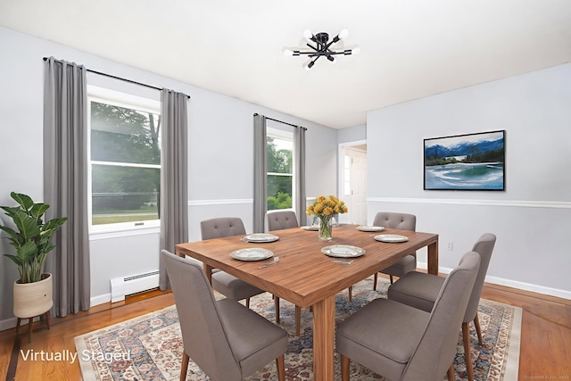 55 Charles Mary Dr, East Hampton, CT 06424 - dining room featuring a baseboard heating unit and light wood-style flooring