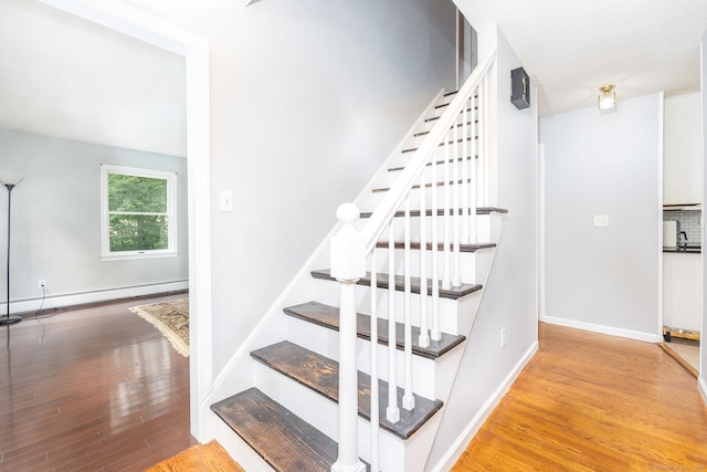 55 Charles Mary Dr, East Hampton, CT 06424 - staircase featuring wood finished floors and baseboard heating