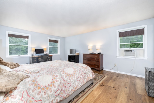 55 Charles Mary Dr, East Hampton, CT 06424 - bedroom with hardwood / wood-style floors, multiple windows, and cooling unit