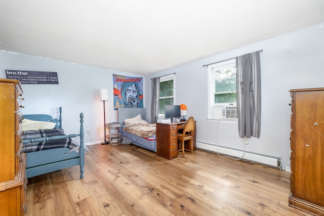 55 Charles Mary Dr, East Hampton, CT 06424 - bedroom featuring a baseboard heating unit, light wood finished floors, and cooling unit