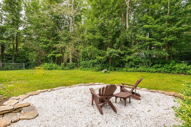 55 Charles Mary Dr, East Hampton, CT 06424 - view of green lawn featuring an outdoor fire pit and a patio