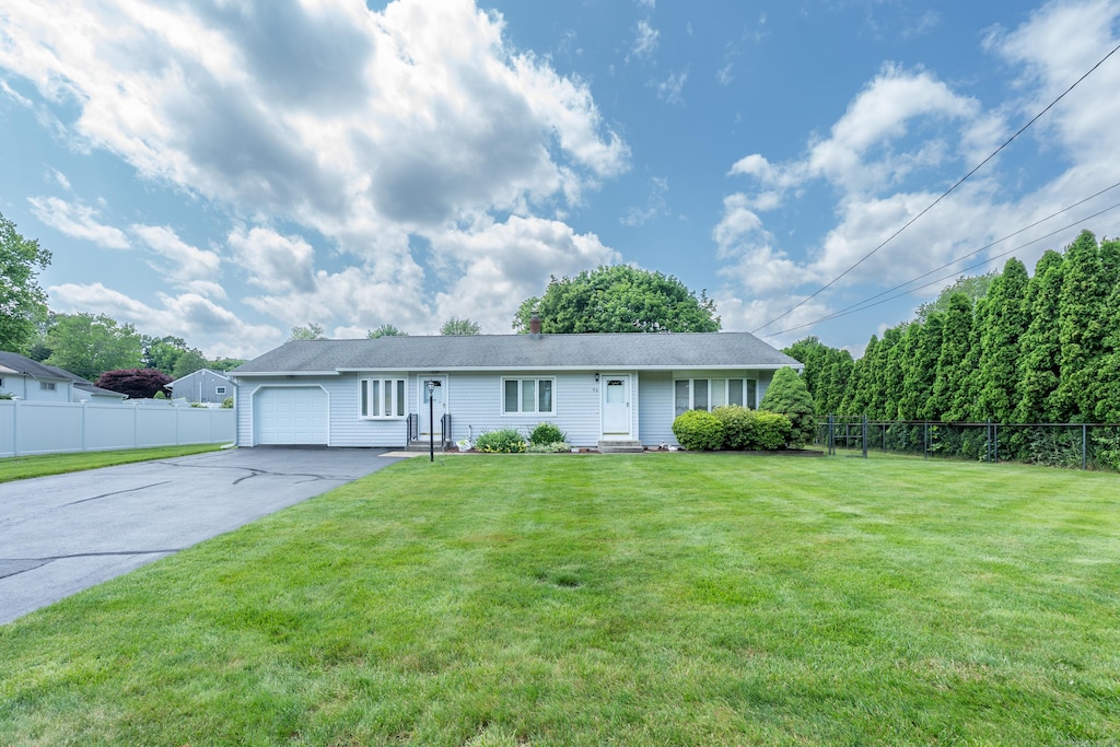 45 Osage Dr, Wallingford, CT 06492 - ranch-style house featuring a garage and driveway