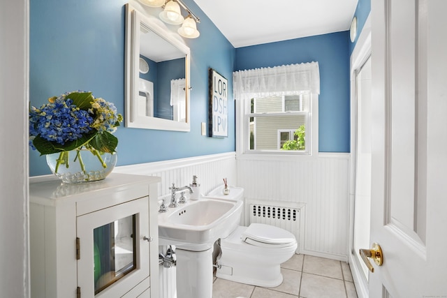 317 Victoria Lawn, Stratford, CT 06615 - full bathroom featuring radiator, a wainscoted wall, tile patterned flooring, and a shower