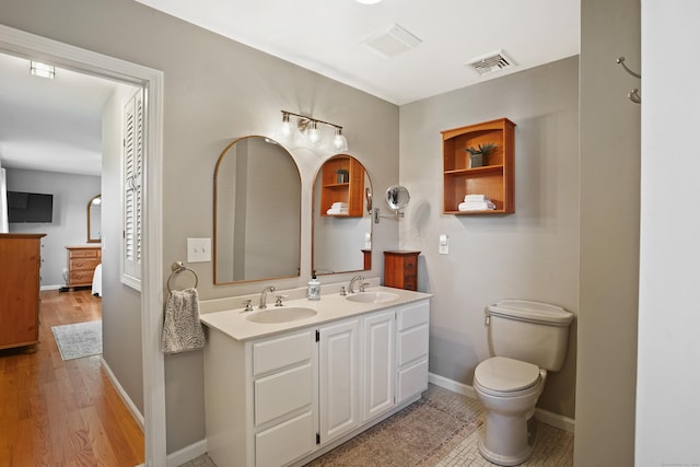 317 Victoria Lawn, Stratford, CT 06615 - full bath with double vanity and wood finished floors