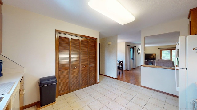 1102 Summer Hill Dr Unit 1102, South Windsor, CT 06074 - kitchen featuring freestanding refrigerator and light tile patterned floors