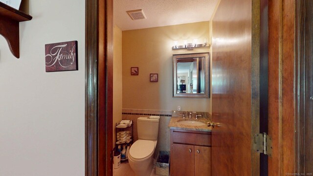 1102 Summer Hill Dr Unit 1102, South Windsor, CT 06074 - bathroom with vanity, a wainscoted wall, tile patterned floors, and tile walls