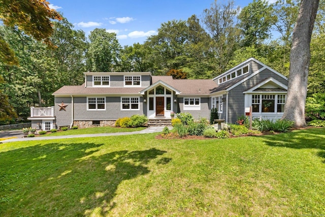 91 Fox Run Rd, New Canaan, CT 06840 - shingle-style home with a front yard and view of wooded area