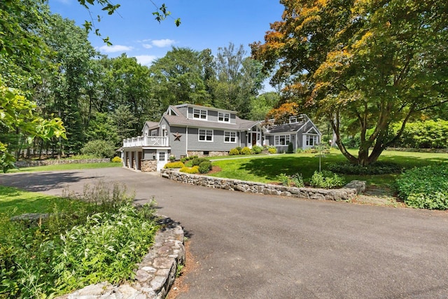 91 Fox Run Rd, New Canaan, CT 06840 - shingle-style home featuring driveway, a front yard, and a wooden deck