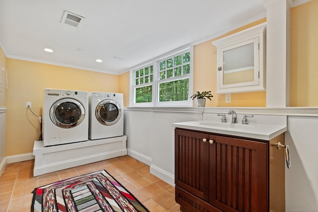 91 Fox Run Rd, New Canaan, CT 06840 - laundry room with separate washer and dryer, cabinet space, light tile patterned floors, and recessed lighting