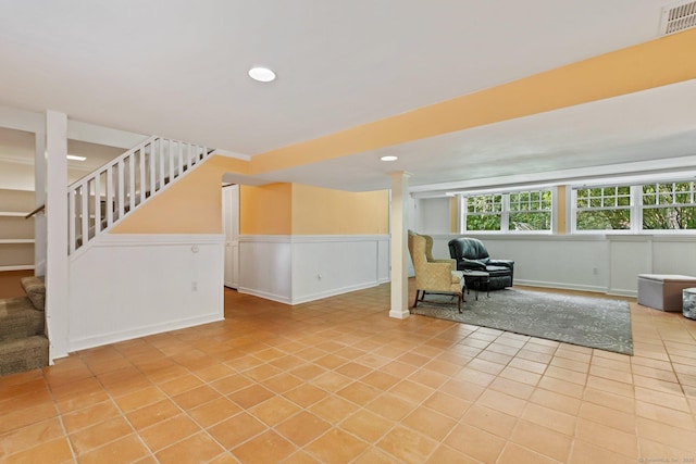 91 Fox Run Rd, New Canaan, CT 06840 - unfurnished room with stairs, tile patterned floors, a wainscoted wall, and recessed lighting