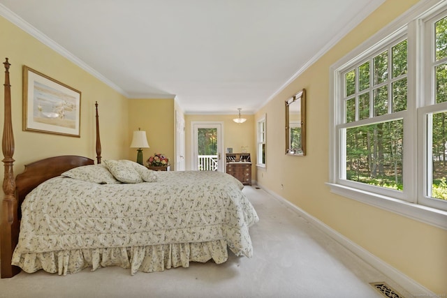 91 Fox Run Rd, New Canaan, CT 06840 - bedroom with access to exterior, light colored carpet, and ornamental molding