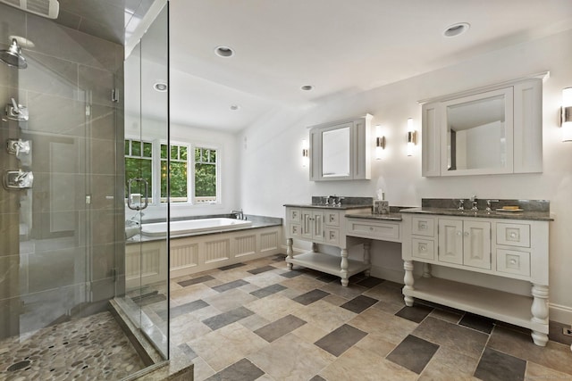 91 Fox Run Rd, New Canaan, CT 06840 - bathroom featuring vanity, a shower stall, a garden tub, and recessed lighting
