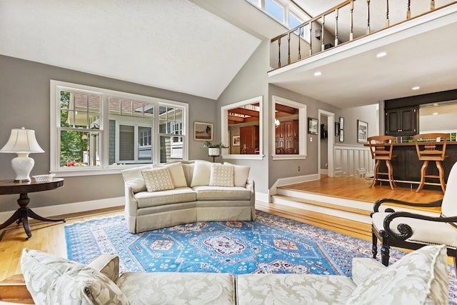 91 Fox Run Rd, New Canaan, CT 06840 - living area featuring wood finished floors, lofted ceiling, and recessed lighting