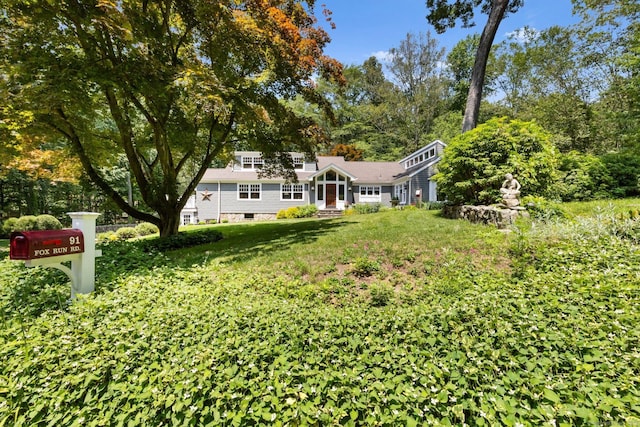 91 Fox Run Rd, New Canaan, CT 06840 - view of front of property with view of scattered trees