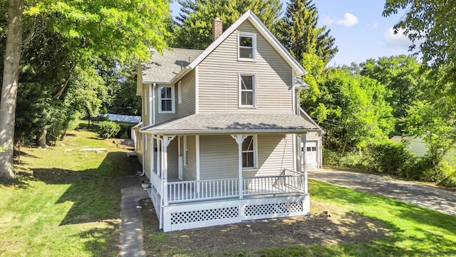 29 Gilyard St, Seymour, CT 06483 - view of front of property with a porch, driveway, a shingled roof, a front lawn, and a garage
