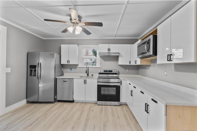 29 Gilyard St, Seymour, CT 06483 - kitchen featuring appliances with stainless steel finishes, under cabinet range hood, light countertops, and ceiling fan