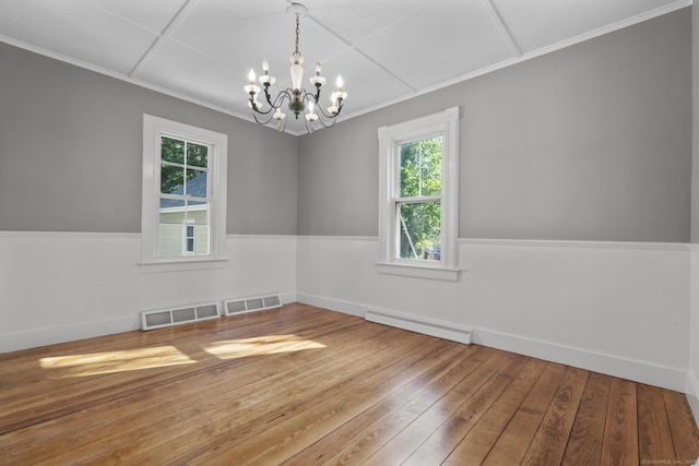 29 Gilyard St, Seymour, CT 06483 - spare room featuring a baseboard heating unit, a chandelier, hardwood / wood-style floors, and ornamental molding