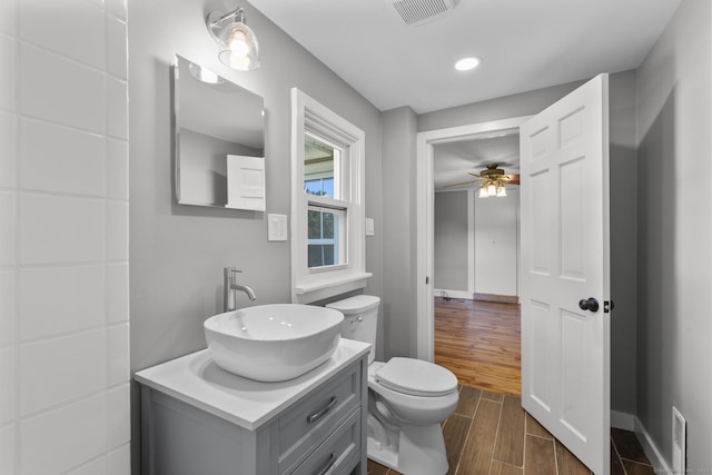 29 Gilyard St, Seymour, CT 06483 - half bathroom with wood finished floors, ceiling fan, vanity, and recessed lighting