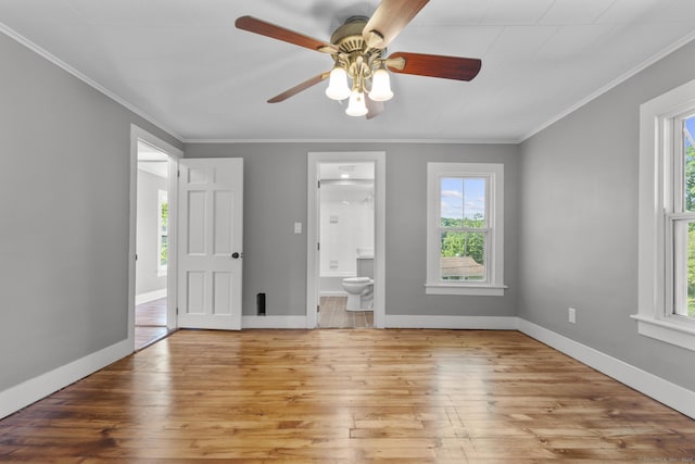 29 Gilyard St, Seymour, CT 06483 - empty room with plenty of natural light, hardwood / wood-style flooring, crown molding, and a ceiling fan