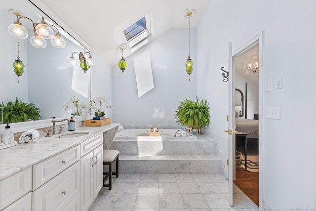 601 Old Stamford Rd, New Canaan, CT 06840 - ensuite bathroom with lofted ceiling, vanity, a garden tub, and marble finish flooring