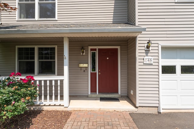 46 Pleasant Ave, Berlin, CT 06037 - entrance to property featuring a porch and a garage