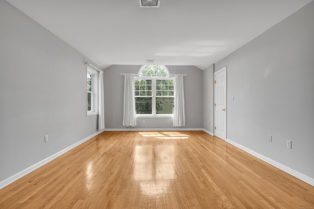 46 Pleasant Ave, Berlin, CT 06037 - empty room featuring light wood-style flooring and vaulted ceiling