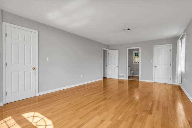 46 Pleasant Ave, Berlin, CT 06037 - unfurnished bedroom with light wood finished floors and multiple windows