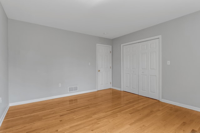 46 Pleasant Ave, Berlin, CT 06037 - unfurnished bedroom with light wood-style flooring and a closet