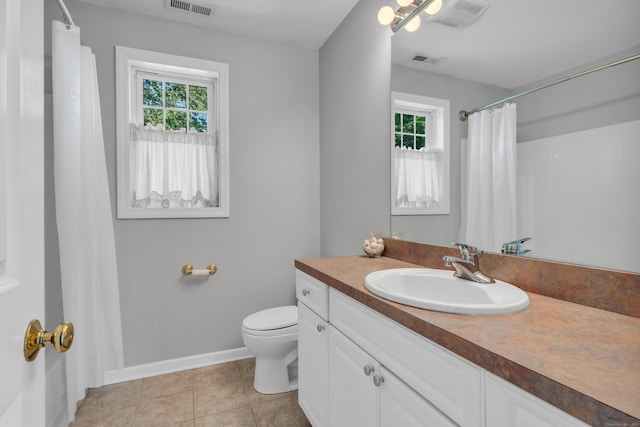 46 Pleasant Ave, Berlin, CT 06037 - full bath with healthy amount of natural light, vanity, tile patterned floors, and a shower with curtain
